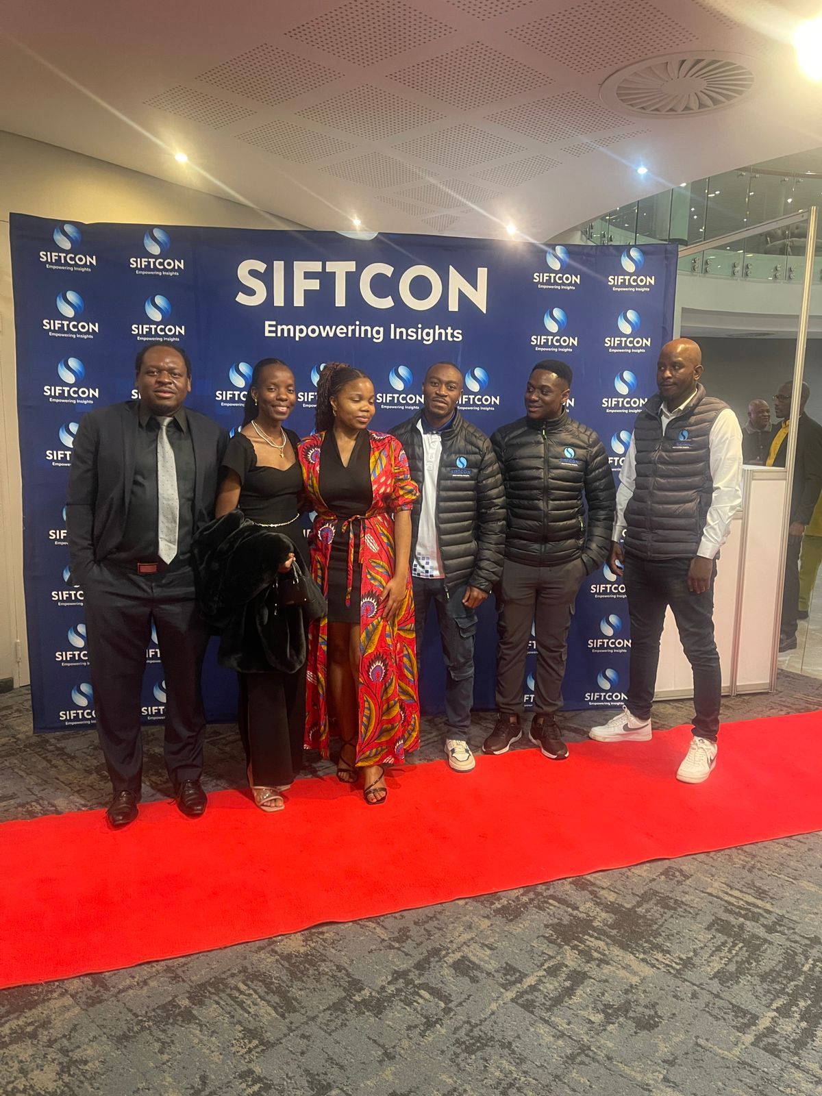 The SIFTCON team and guests at a branded industry event.