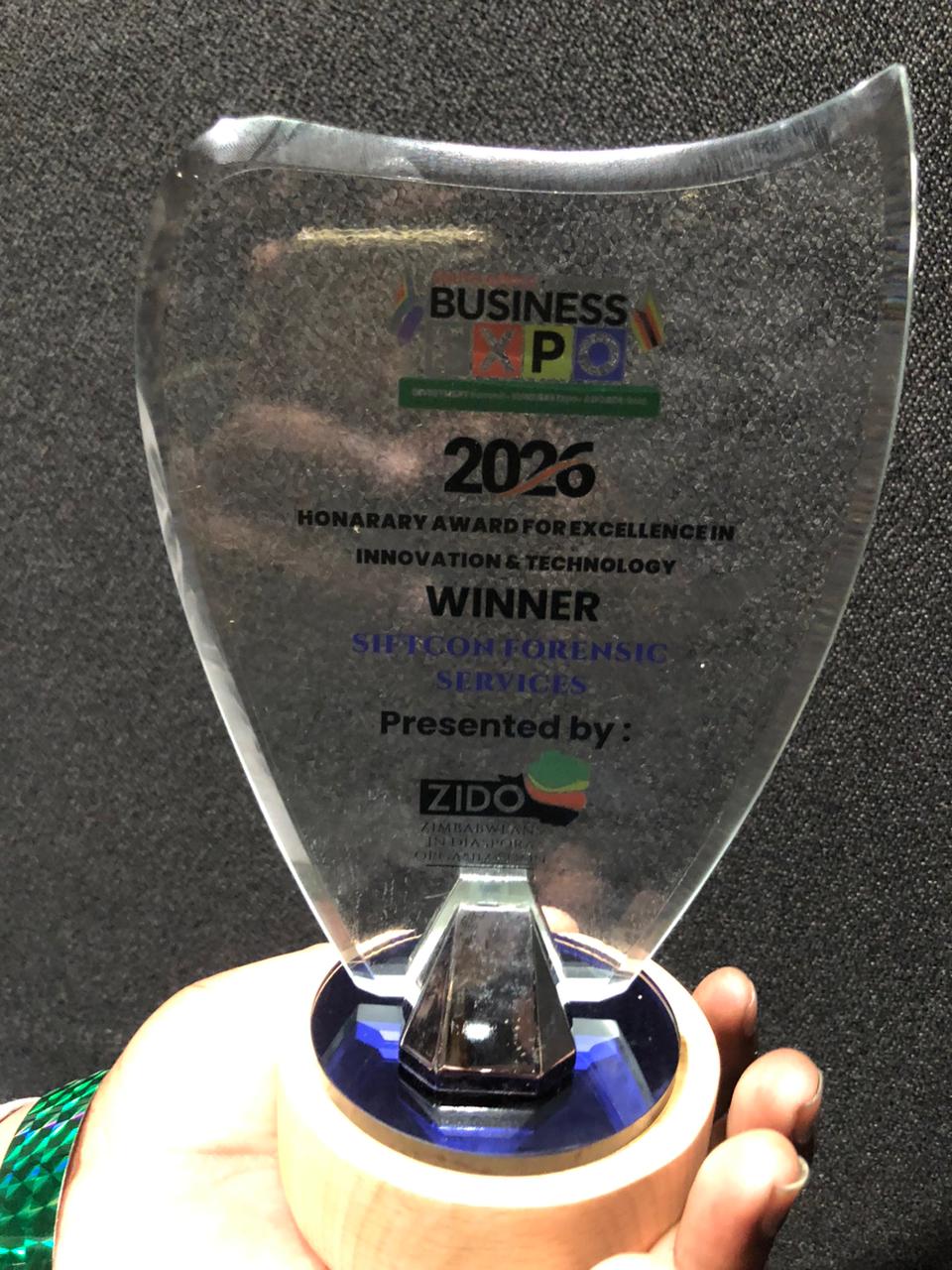 The 2025 ZIDO Business Expo trophy awarded to SIFTCON Forensic Services.